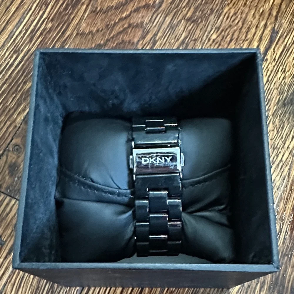 DKNY White Dial Silver-Tone Bezel Black Strap Watch